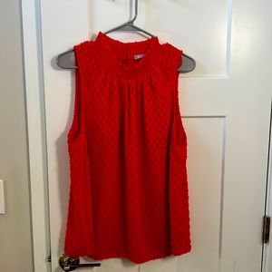 Bright red blouse
